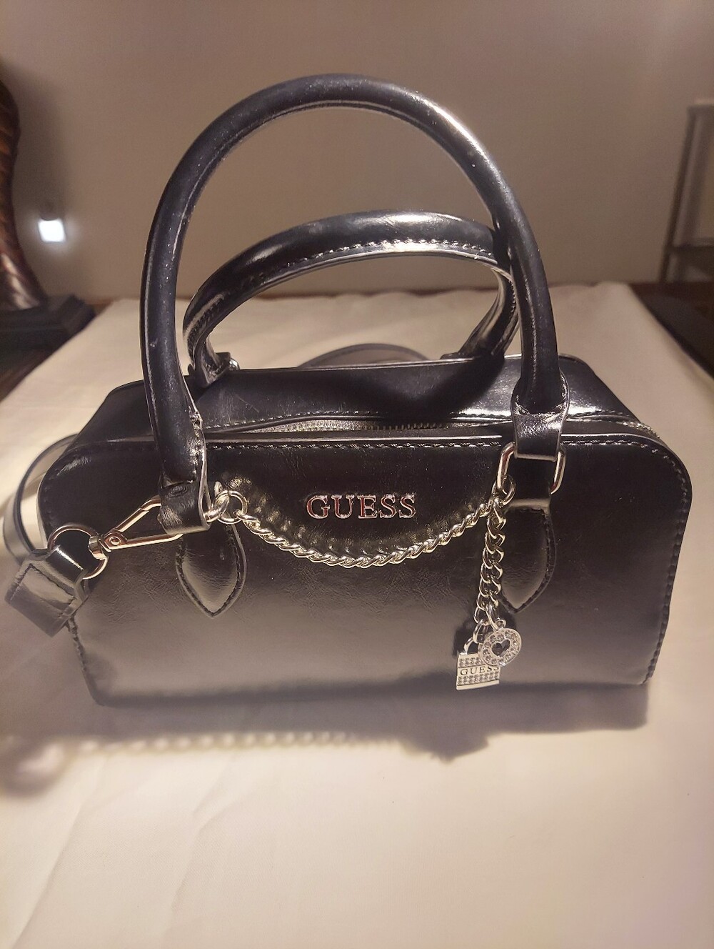 GUESS Patent Leather Purse with Chain Details.